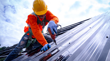 Laborer works on roof where he might be tested for drugs.